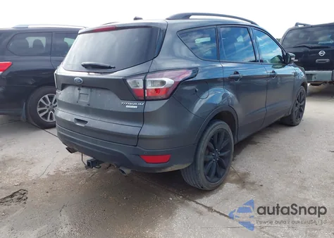 2017 Ford Escape Titanium z USA, uszkodzony, nr VIN 1FMCU0J95HUC34066